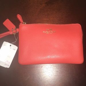 NWT Coach Orange Wristlet